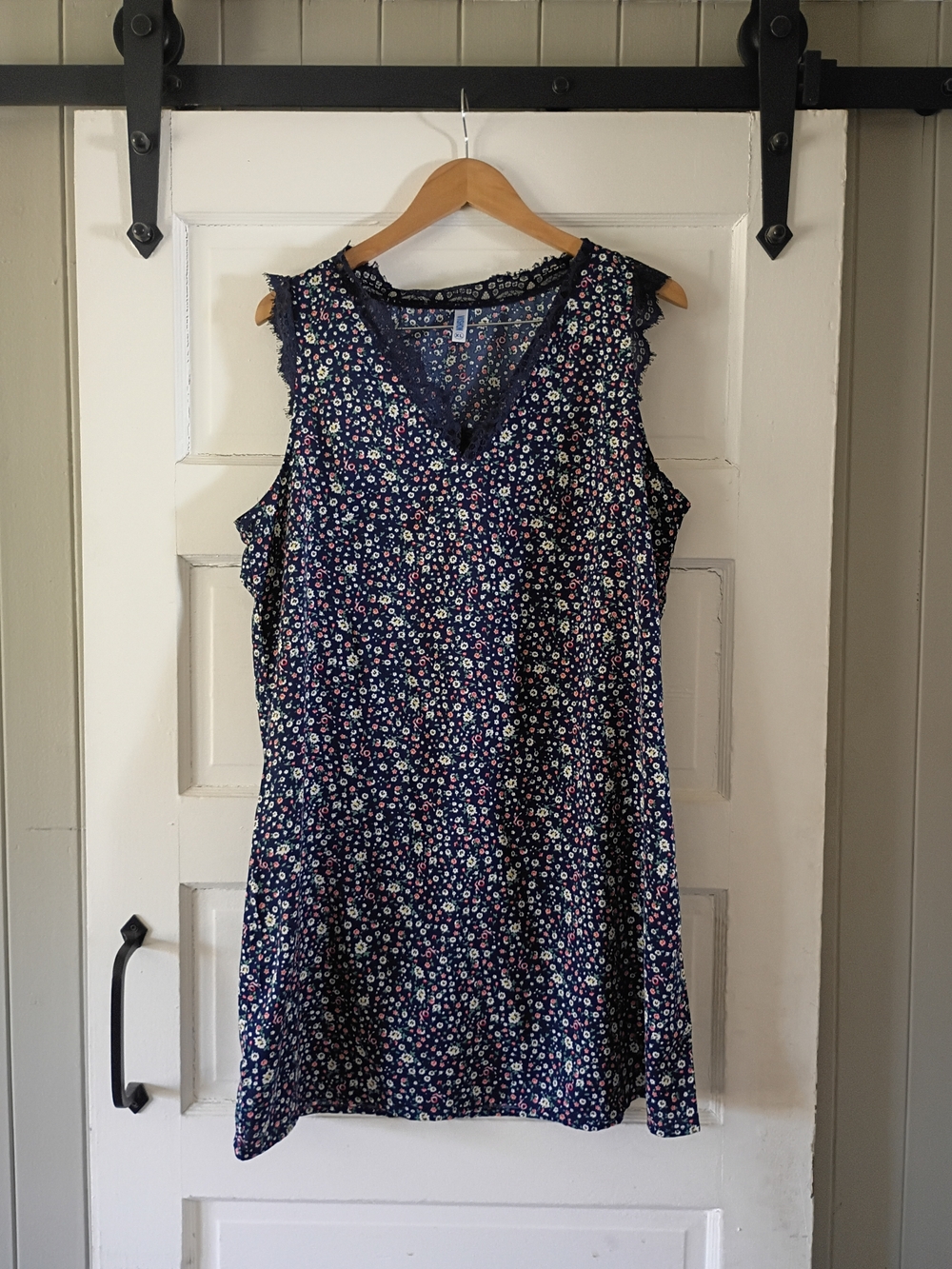 Sleeveless Navy Floral V-Neck Mini Dress with Lace Trim